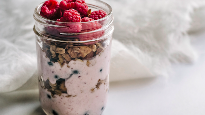 Simple coconut yogurt with granola and berries